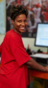 Smiling woman at computer